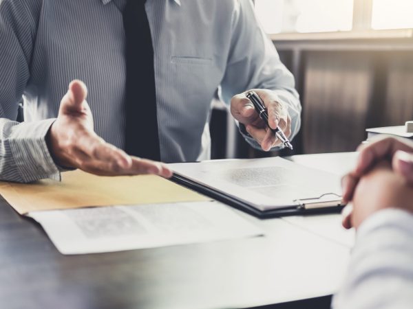 businessman-and-male-lawyer-or-judge-consult-having-team-meeting-with-client